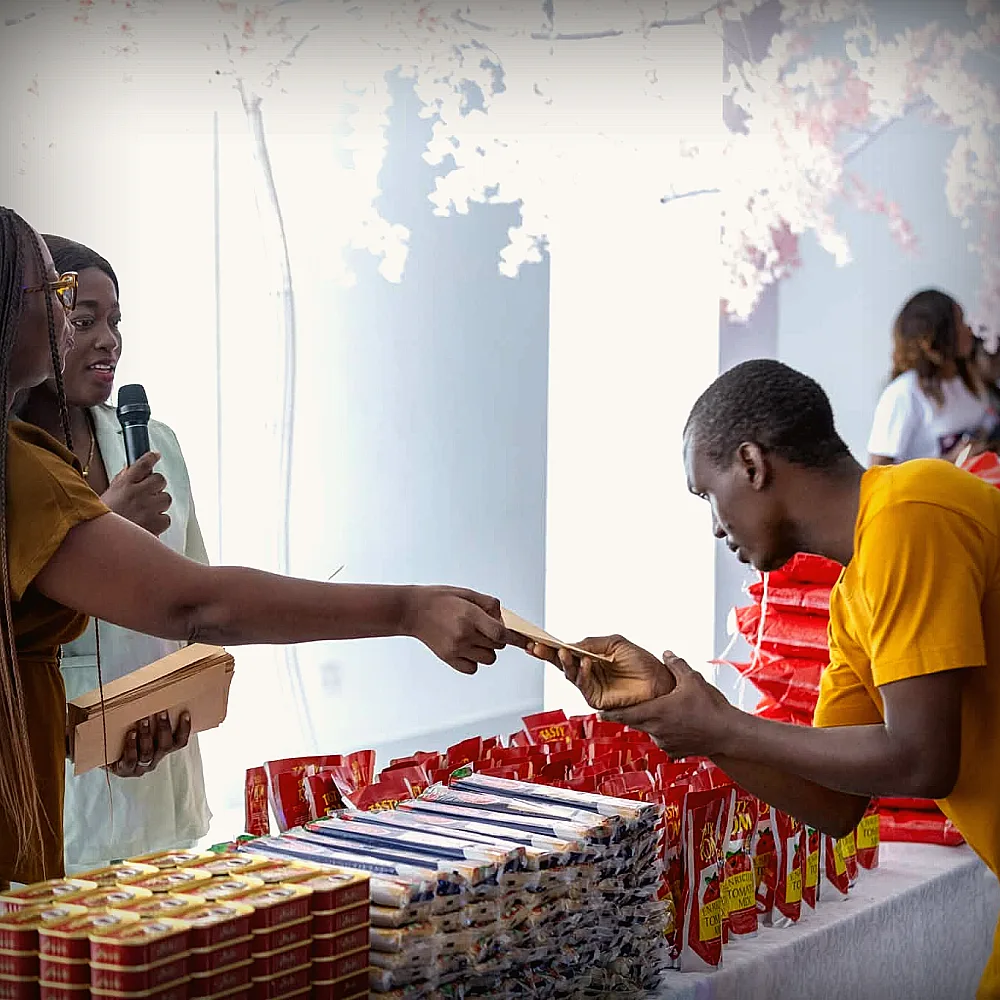Volunteers distributing donations through OneSound Charity